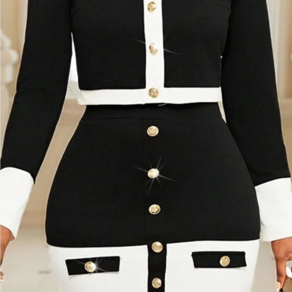 Brand new Elegant Black and White Buttoned short jacket and  Skirt